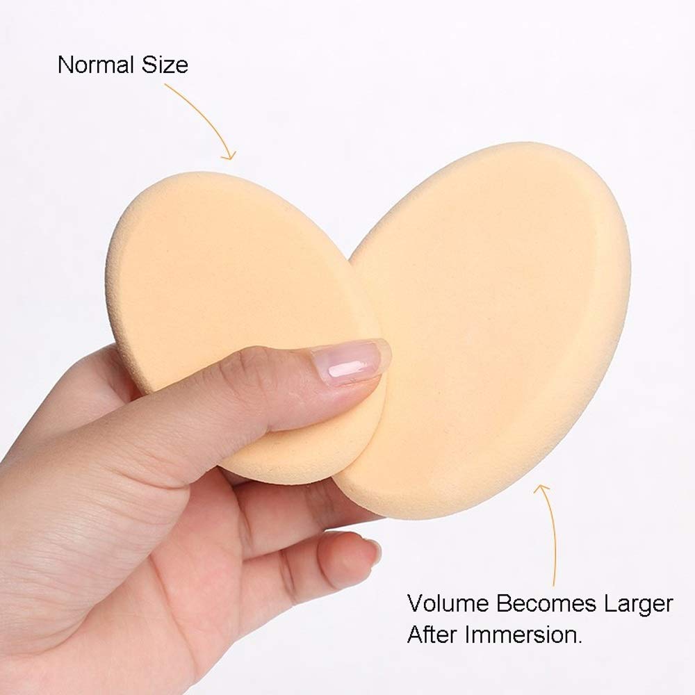 Cushion Foundation Puff in hand demonstrating normal size and volume increase after immersion.