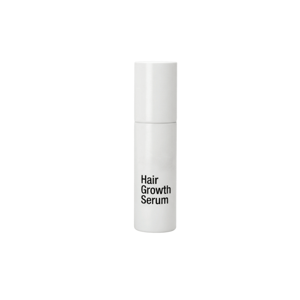 Hair Growth Serum bottle for revitalizing and enhancing hair health within the Hair Care Kit.