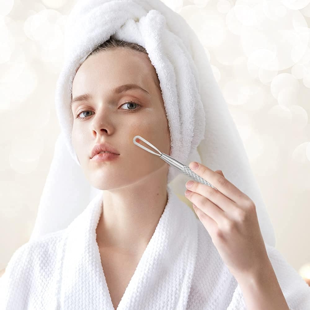 Professional Blackhead Extractor Tool in use by a woman with a towel wrap, demonstrating skincare.