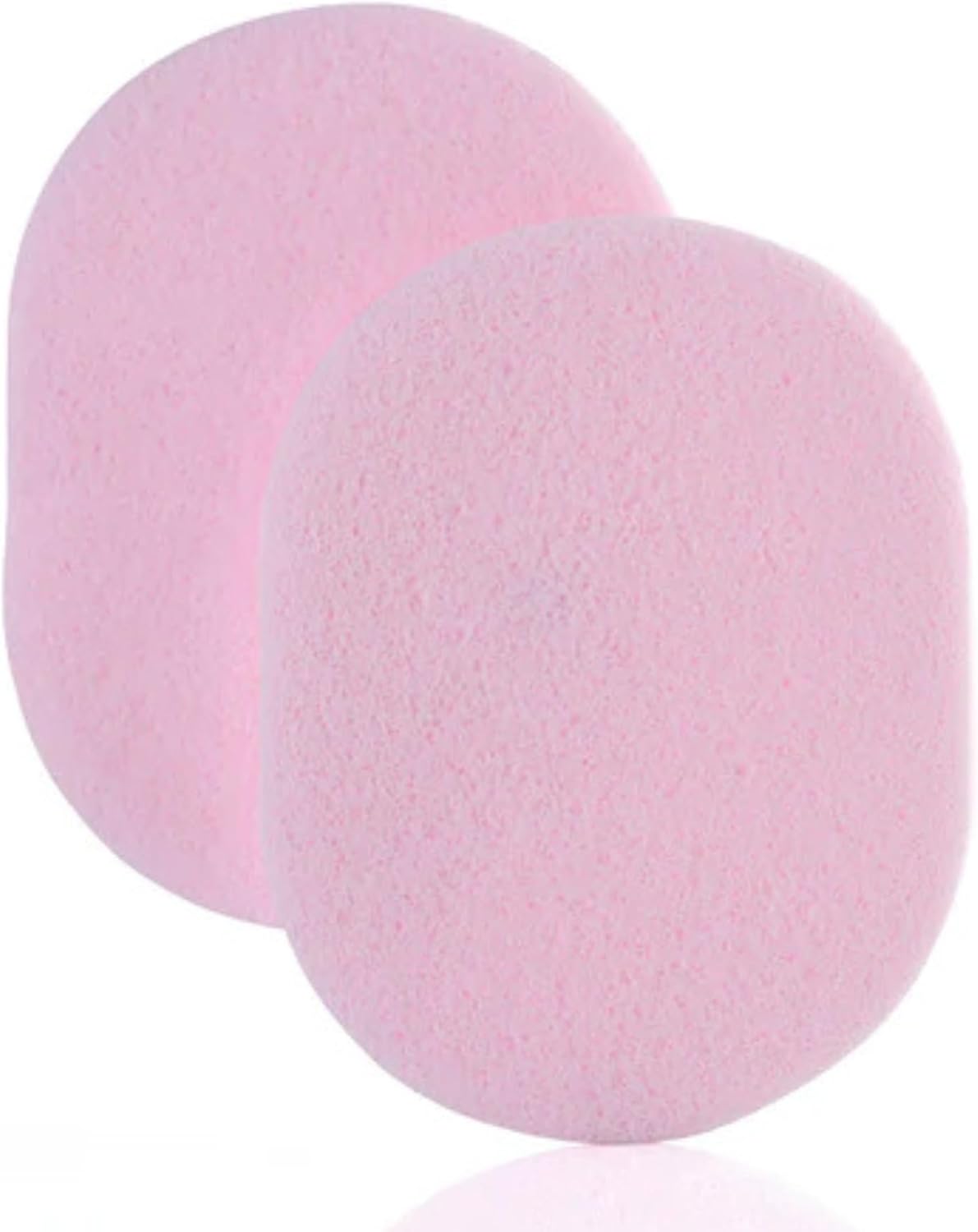 Compressed Facial Cleansing Sponges, soft pink biodegradable sponges for gentle facial cleansing and exfoliation.